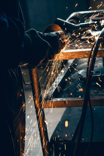 depositphotos_228802634-stock-photo-close-car-mechanic-hands-welding